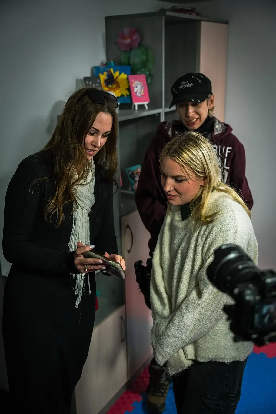 Kelsey Kimberlin watching a video on a phone