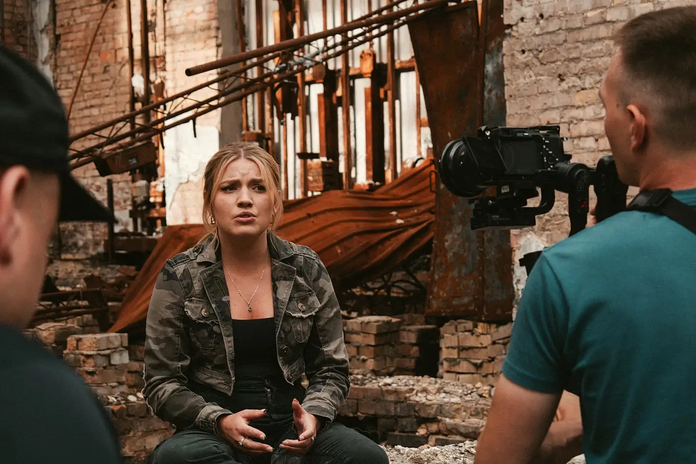 Kelsie Kimberlin films near the destroyed cultural center