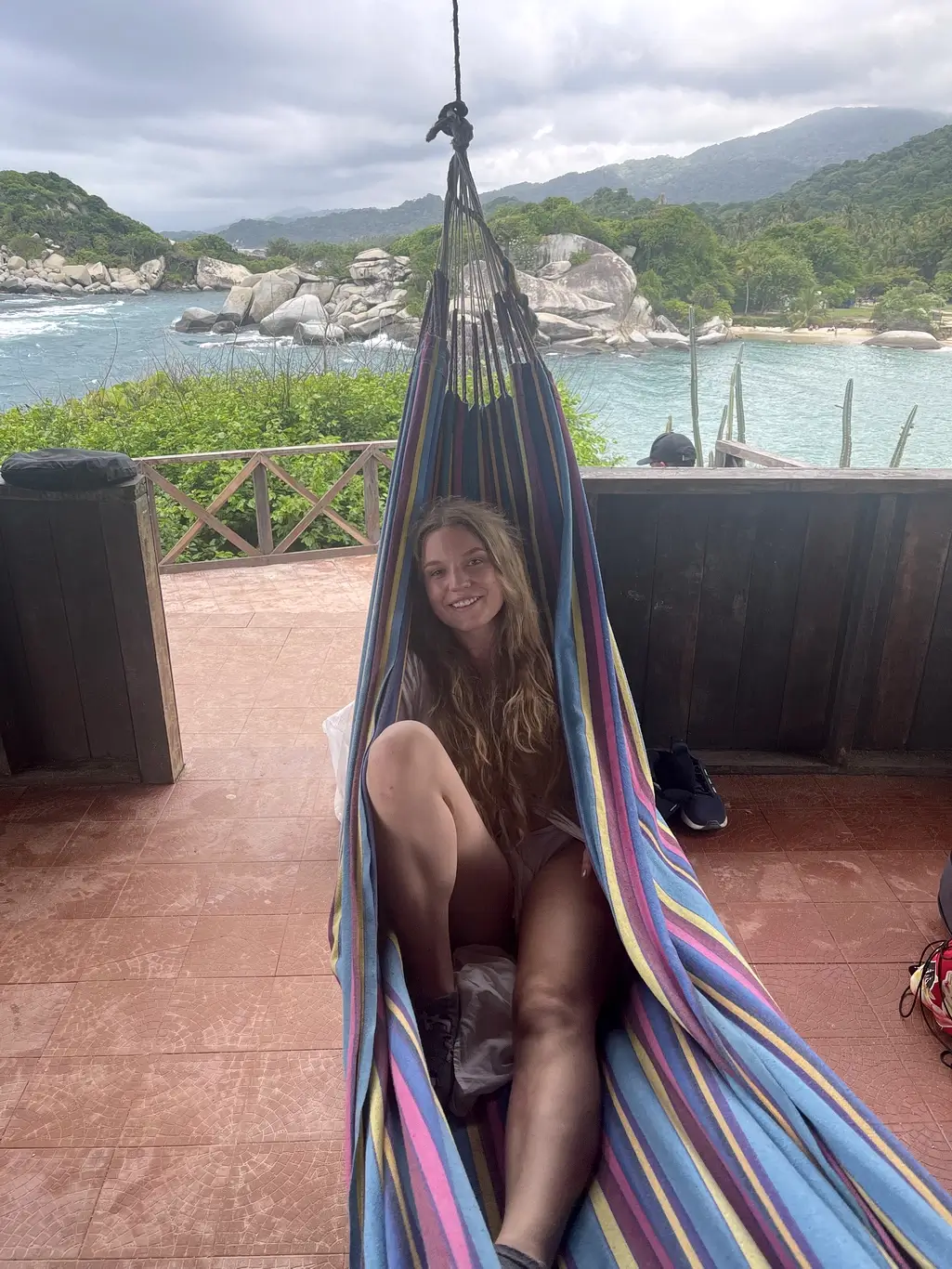 Kelsie Kimberlin relaxes in a hammock by the sea