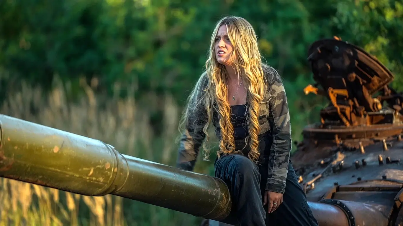 Kelsie Kimberlin sits on a tank